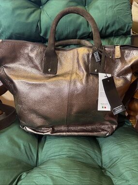 Bronze leather duffel style purse